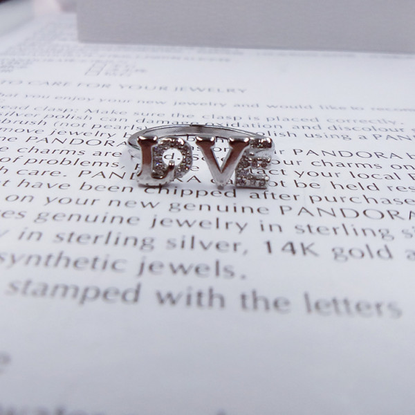9301 LOVE ADJUSTABLE AMERICAN-DIAMOND RING 9301 LOVE ADJUSTABLE AMERICAN-DIAMOND RING