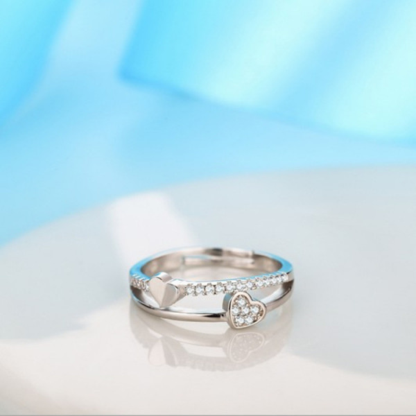 9305 SILVER LAYERED HEARTS ADJUSTABLE AD RING 9305 SILVER LAYERED HEARTS ADJUSTABLE AD RING