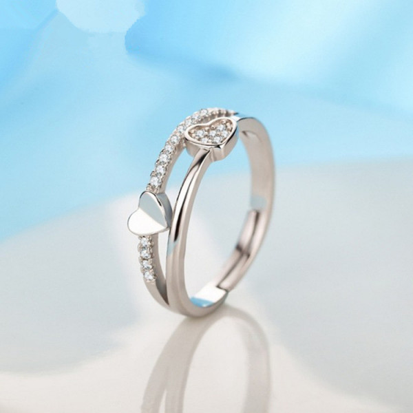 9305 SILVER LAYERED HEARTS ADJUSTABLE AD RING 9305 SILVER LAYERED HEARTS ADJUSTABLE AD RING